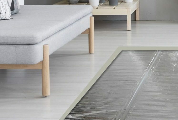 Warmup's Foil Heater under a carpet in a living room.